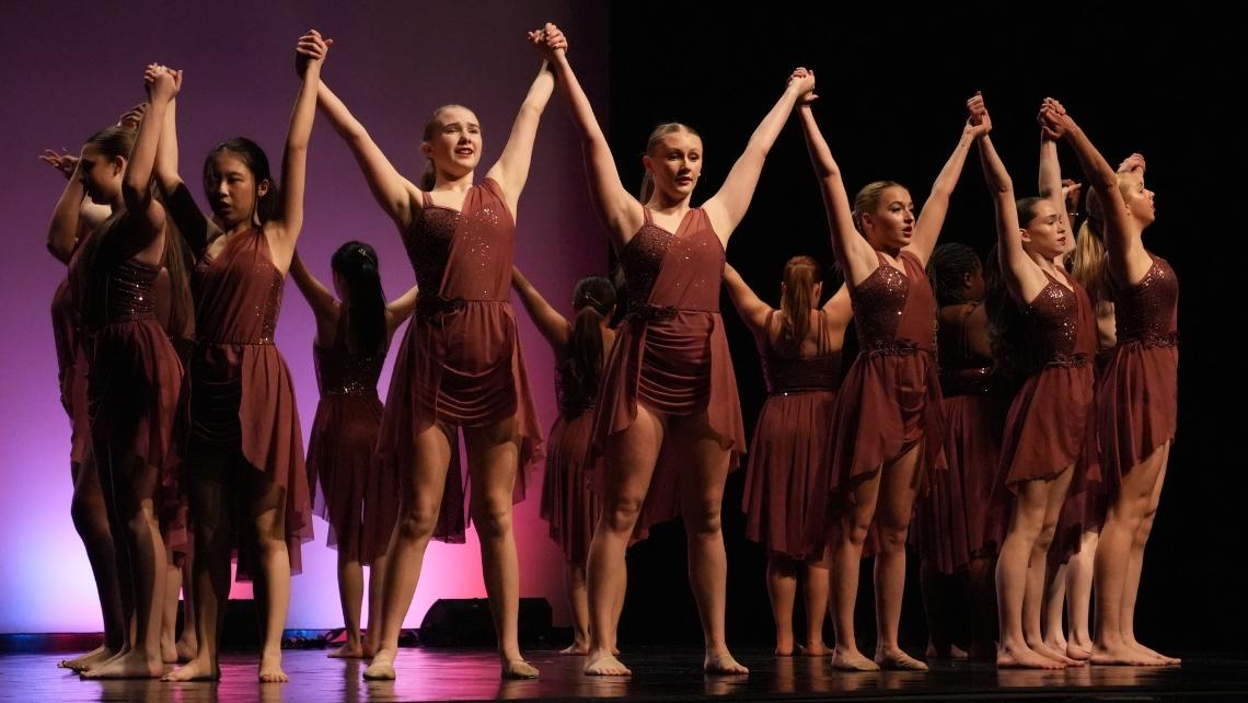 Image of a group of dancers on stage