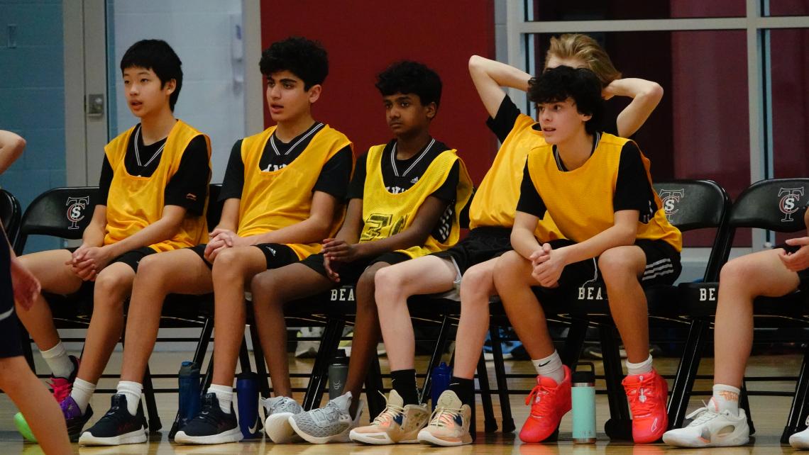 image of basketball players on the bench
